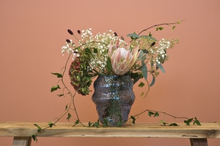 Blommor i en kruka
